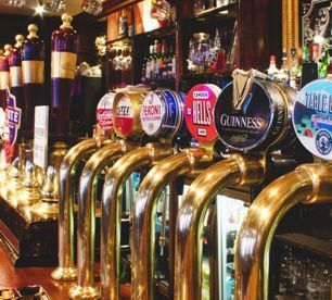 man signing pub liscense