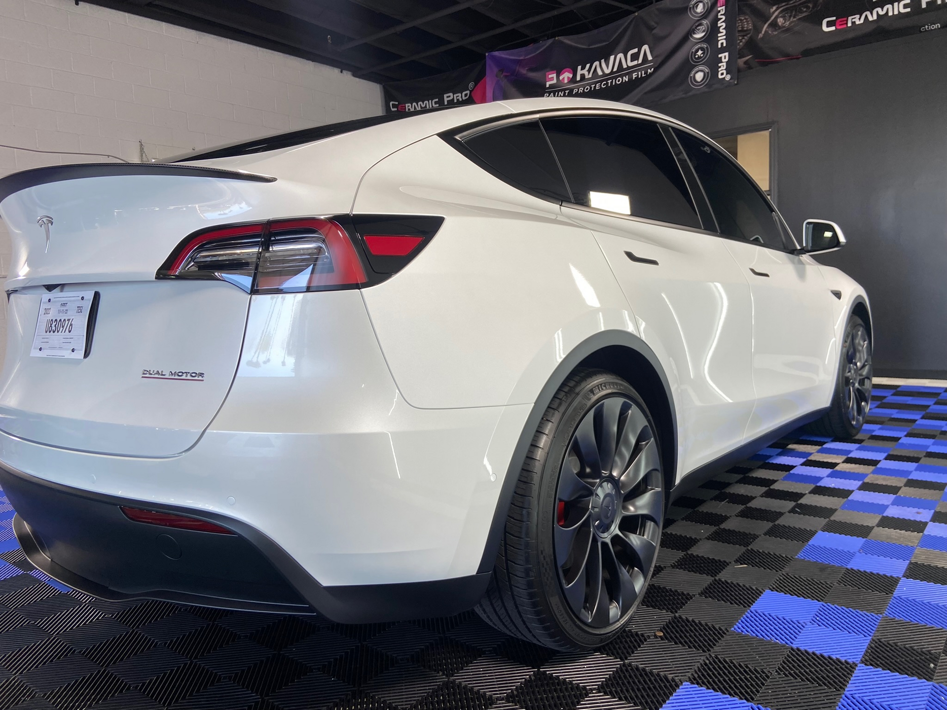 white car with paint protection film applied