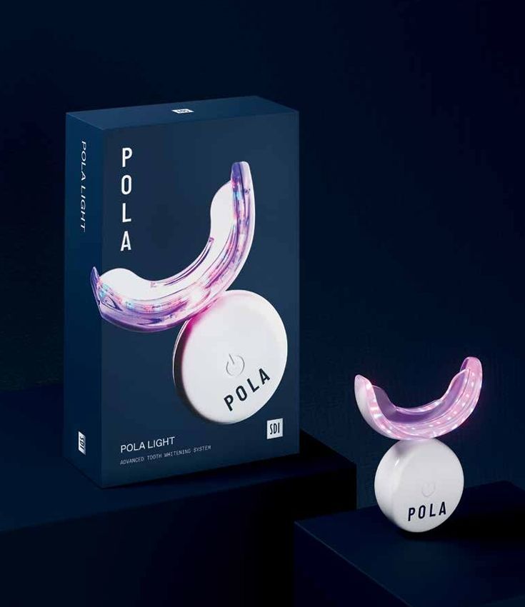 A box of pola teeth whitening kit is sitting on a table.