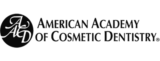 The logo for the american academy of cosmetic dentistry