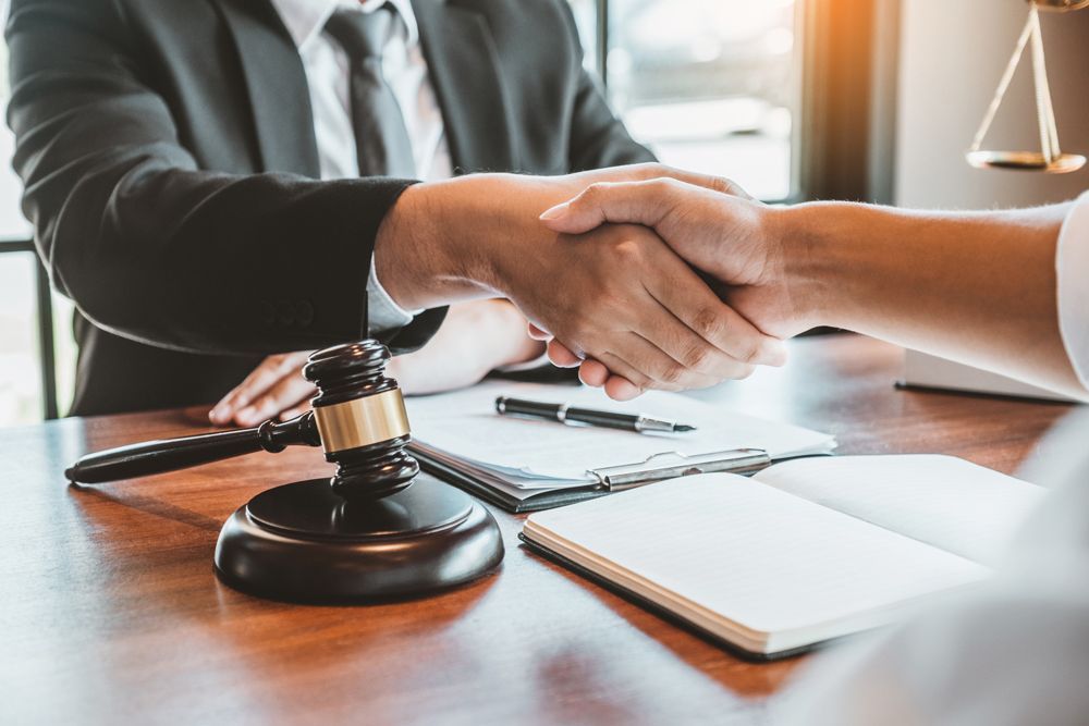 Handshaking — Alachua, FL — Bingham & Mikolaitis, P.A.