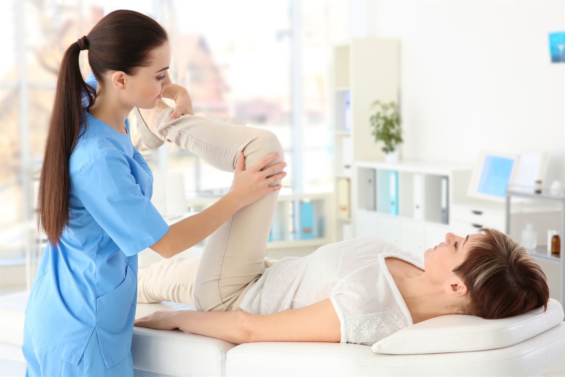 Therapist Helping a Woman with Her Joint Pain — Goulburn Physiotherapy Centre in Goulburn, NSW