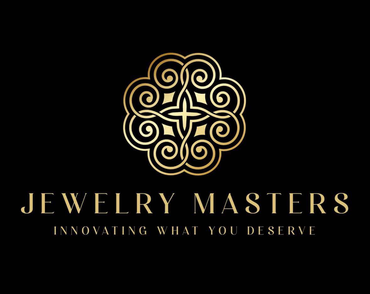 Gold logo for Jewelry Masters featuring an intricate, symmetrical floral design on a black background.