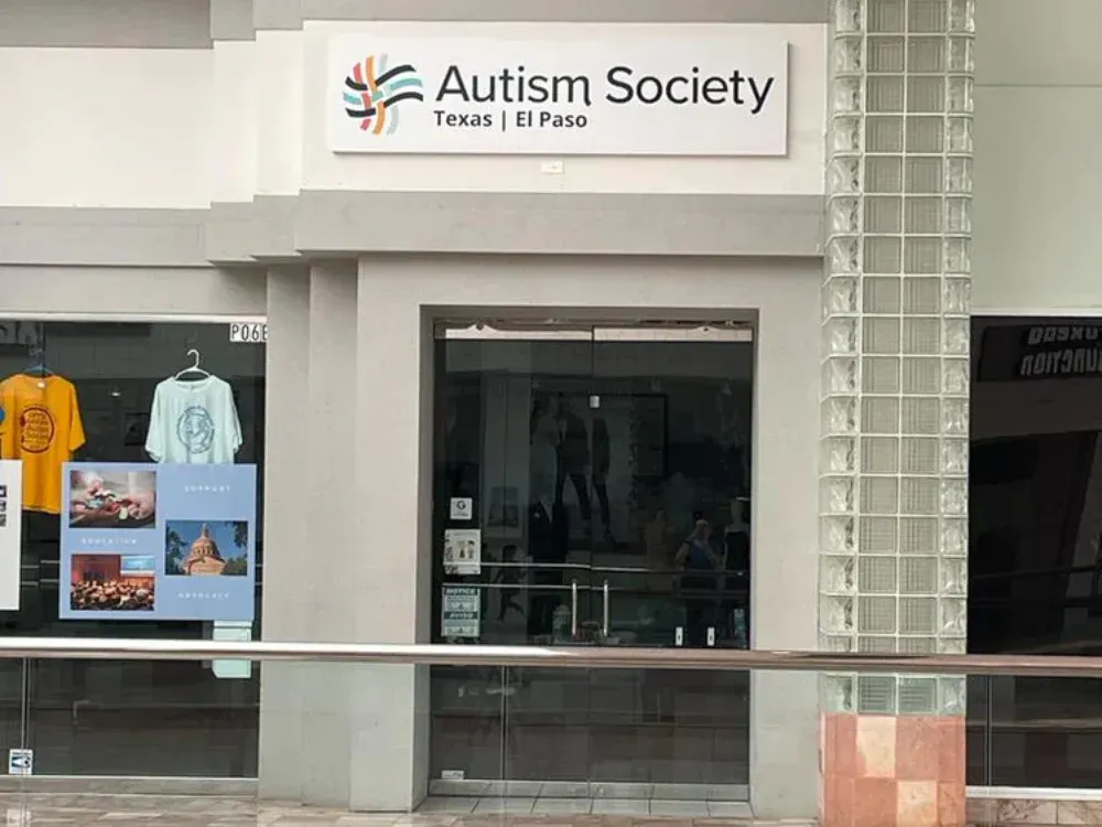 A store front for the autism society in a mall