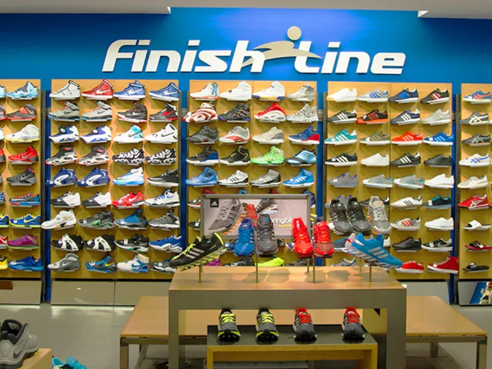 A finish line store with lots of shoes on display