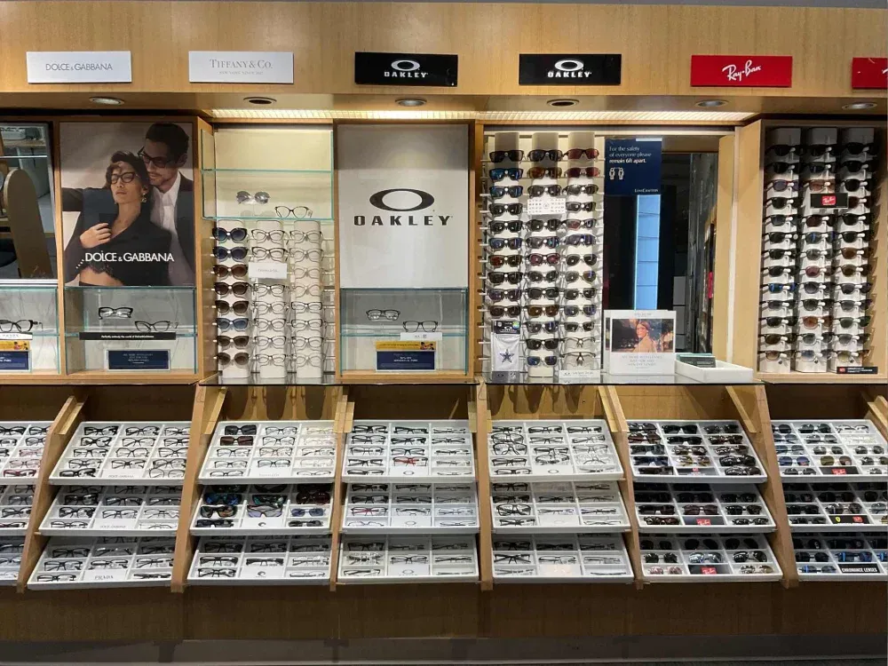 A store display of sunglasses and oakley sunglasses