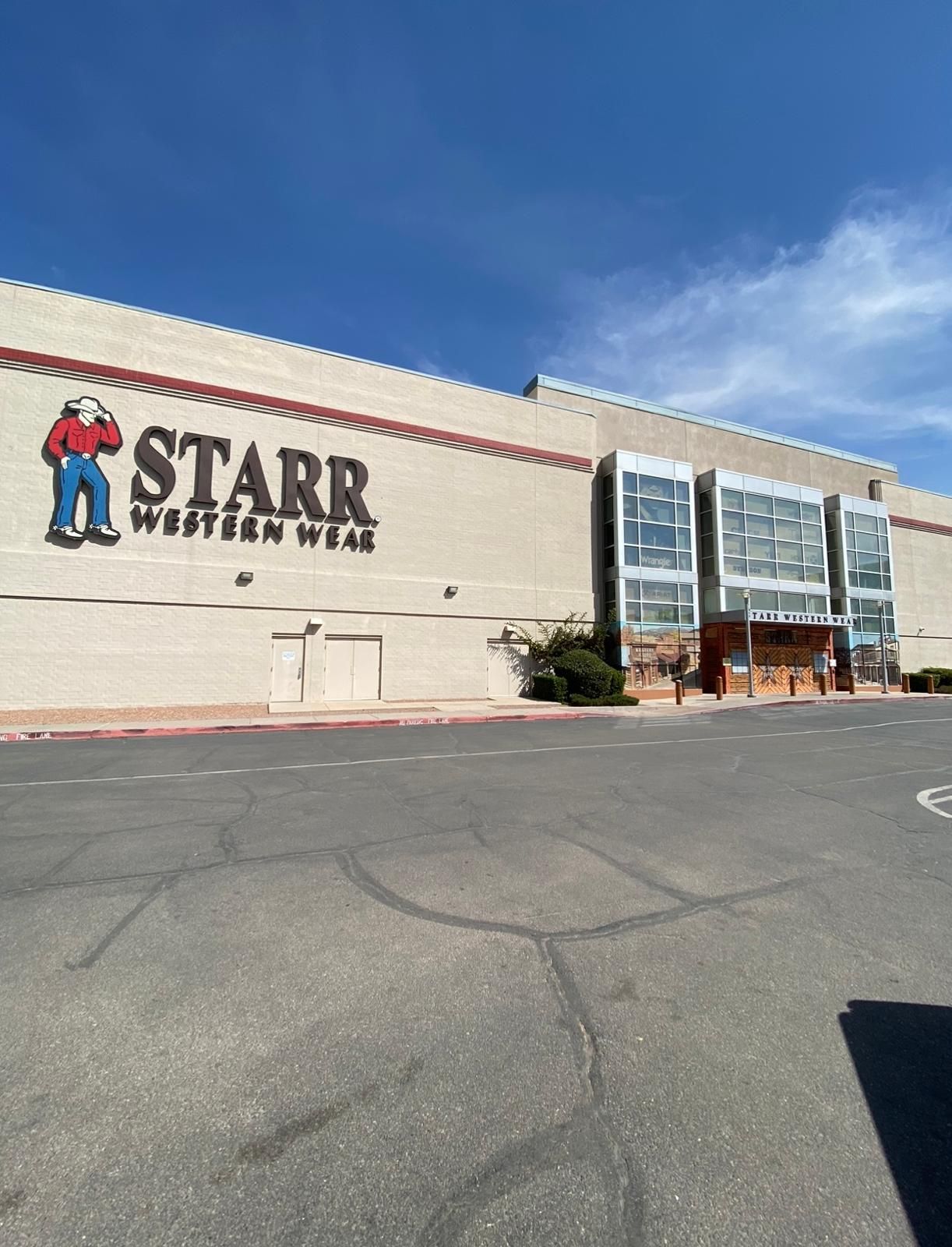 A store called stark western wear has a lot of windows