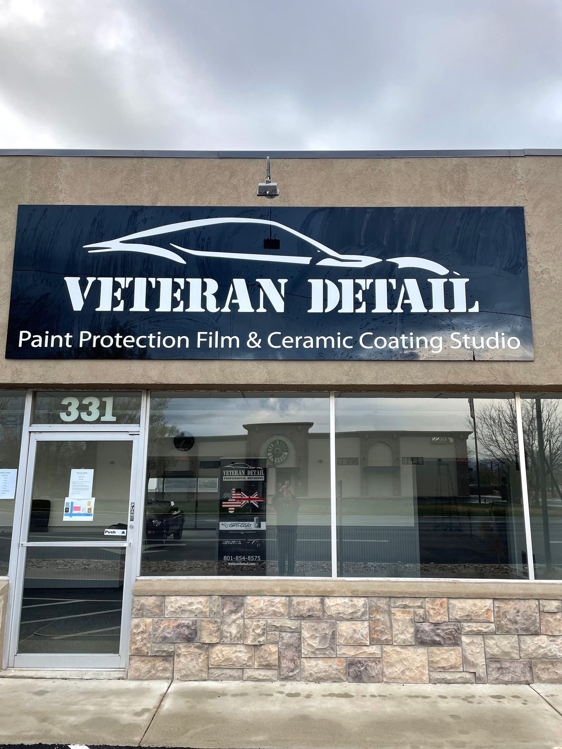 The front of a veteran detail paint protection film and ceramic coating studio.