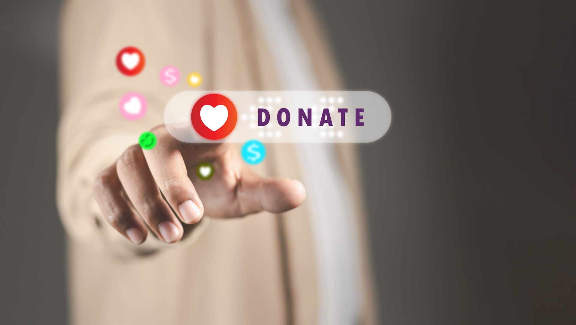 A person is pressing a donate button on a virtual screen.