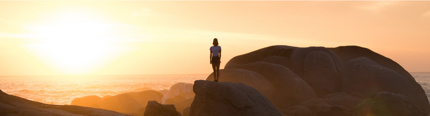 Woman on a mountain top