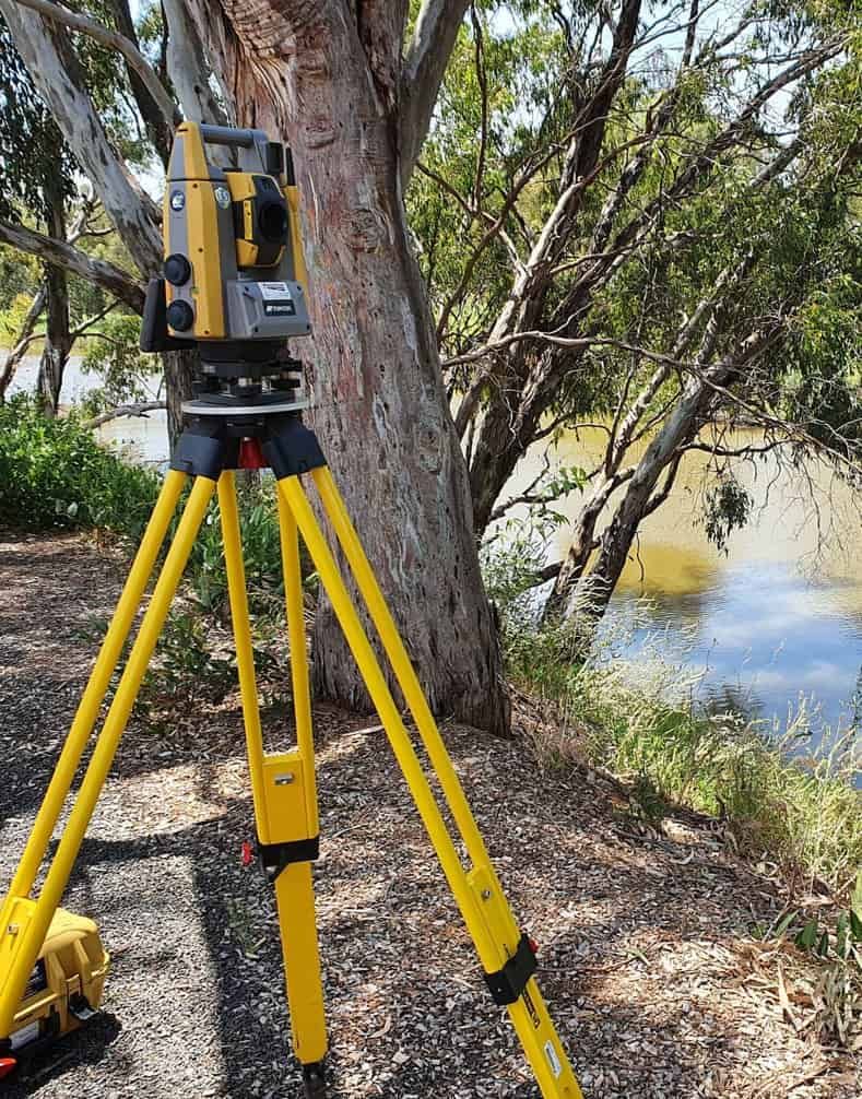 A Yellow Tripod With A Camera On Top Of It — Western Survey Pty Ltd In Coonabarabran, NSW