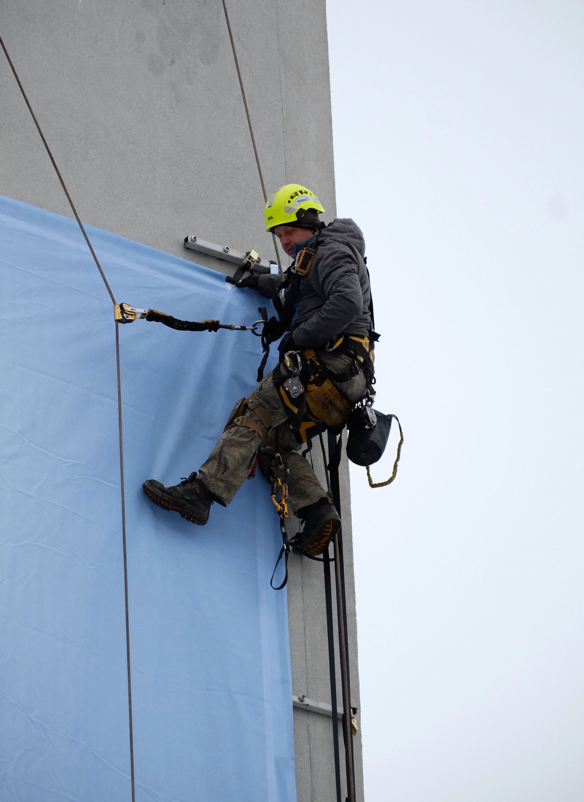 Roof fall protection anchors and harness storage system
