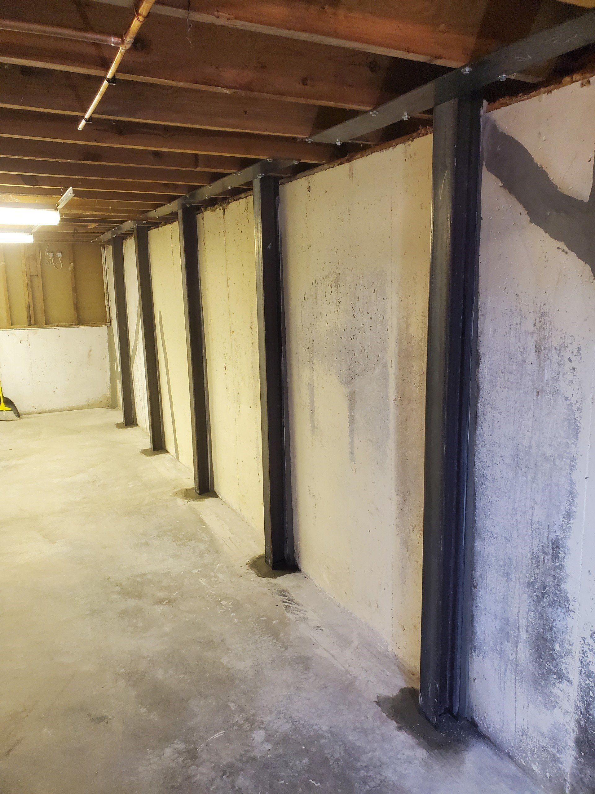 I-Beams Installed On Basement — Kansas City, KS — Glenn Marsee & Son Foundation Repair Inc.