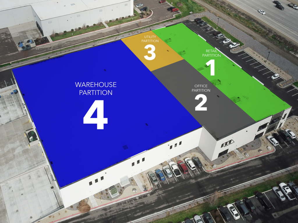 An aerial view of a warehouse with the number 4 on it