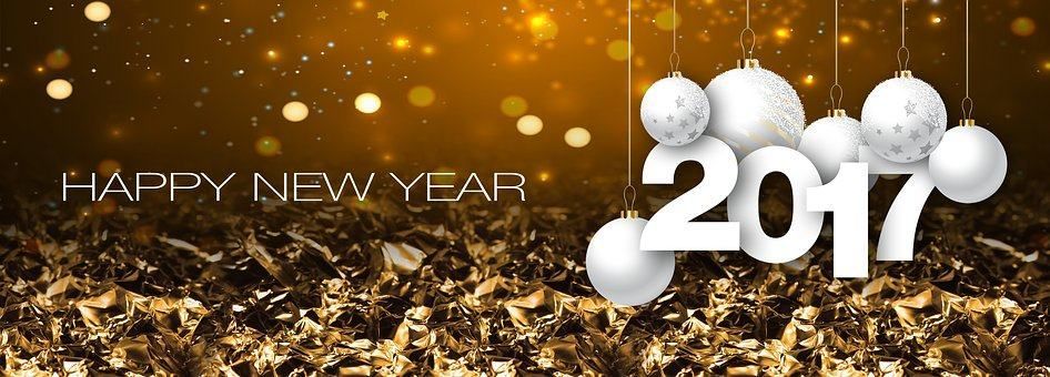 A happy new year greeting card with christmas balls hanging from the ceiling