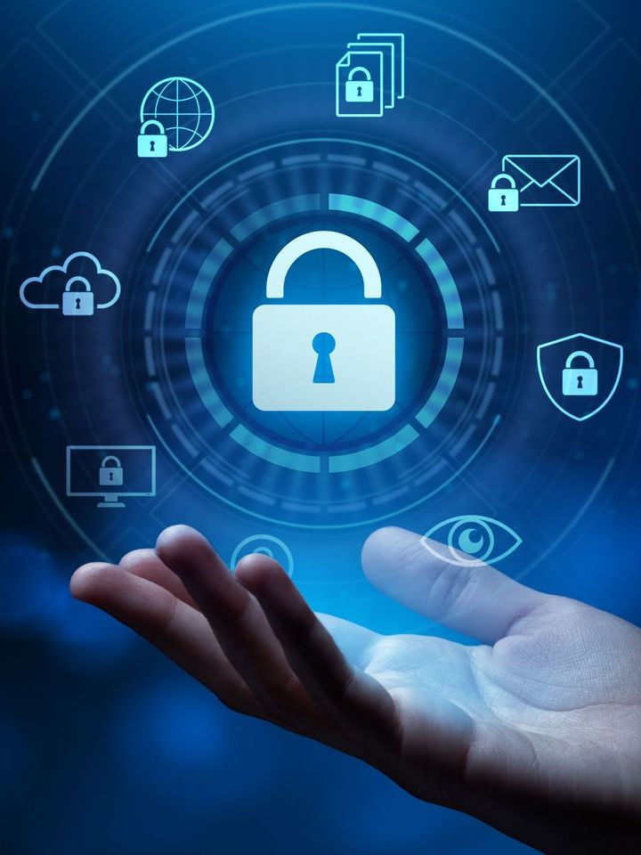 Hand holding a glowing padlock surrounded by security icons like a shield, cloud, and email, suggesting data protection.