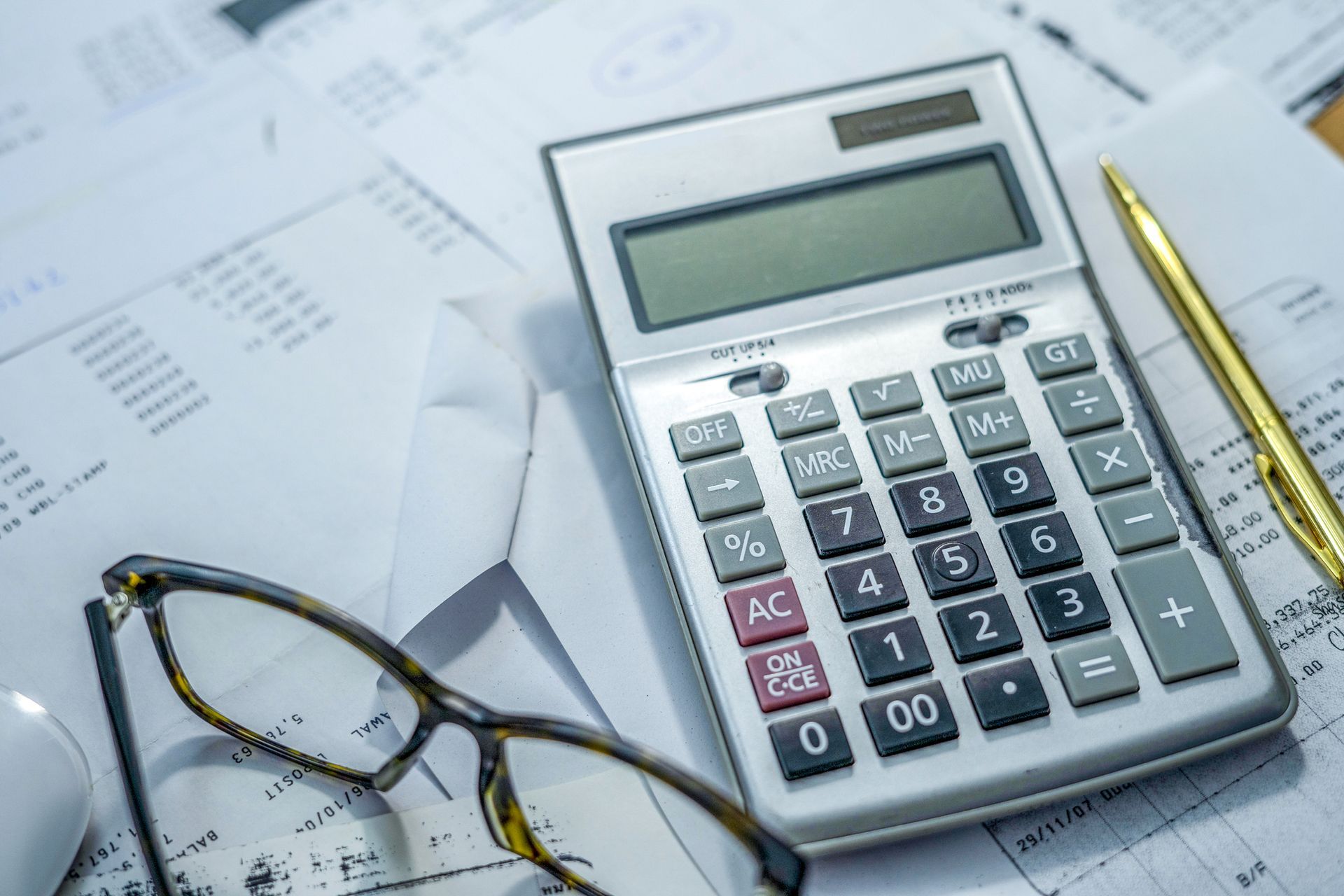 Glasses and Calculator — Boulder, CO — Small Business Accountants of Colorado