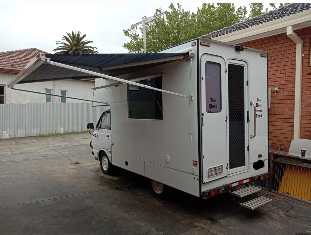 A Campervan with Awning Extended — Revive Caravan Repairs in Kippa-Ring, QLD