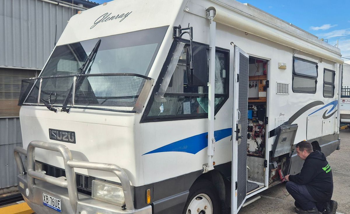 Technician Servicing A Caravan In Brisbane