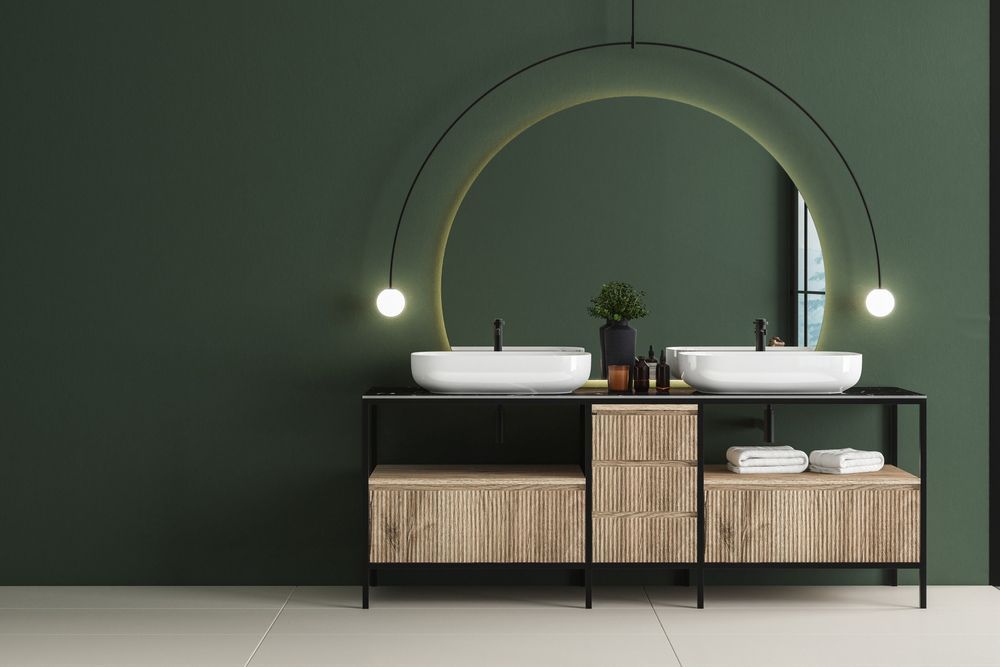 A Bathroom With Two Sinks And A Large Mirror And An Aesthetic Lights — Electrician In Wagga Wagga, NSW