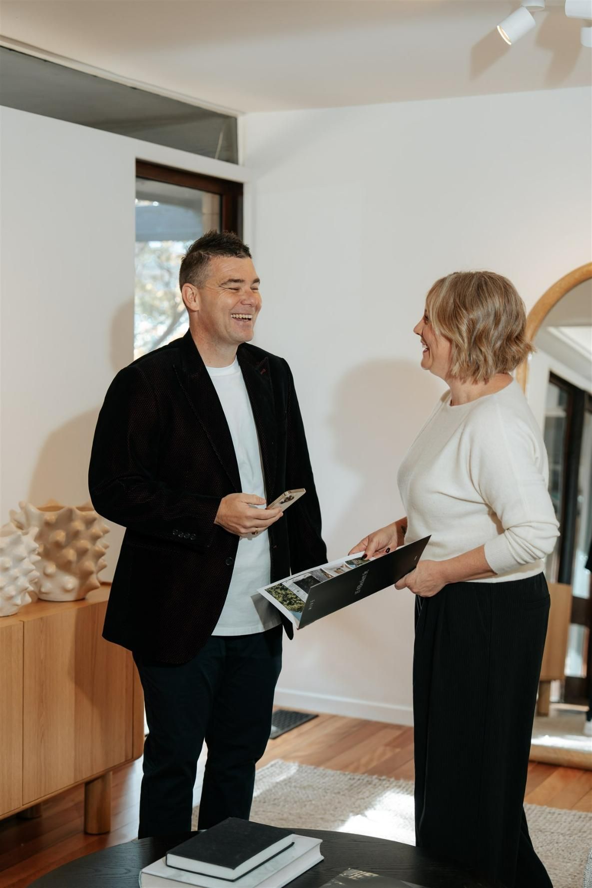 A Man and a Woman Are Talking to Each Other — Hyde Burchell Buyers Agents In Canberra, ACT