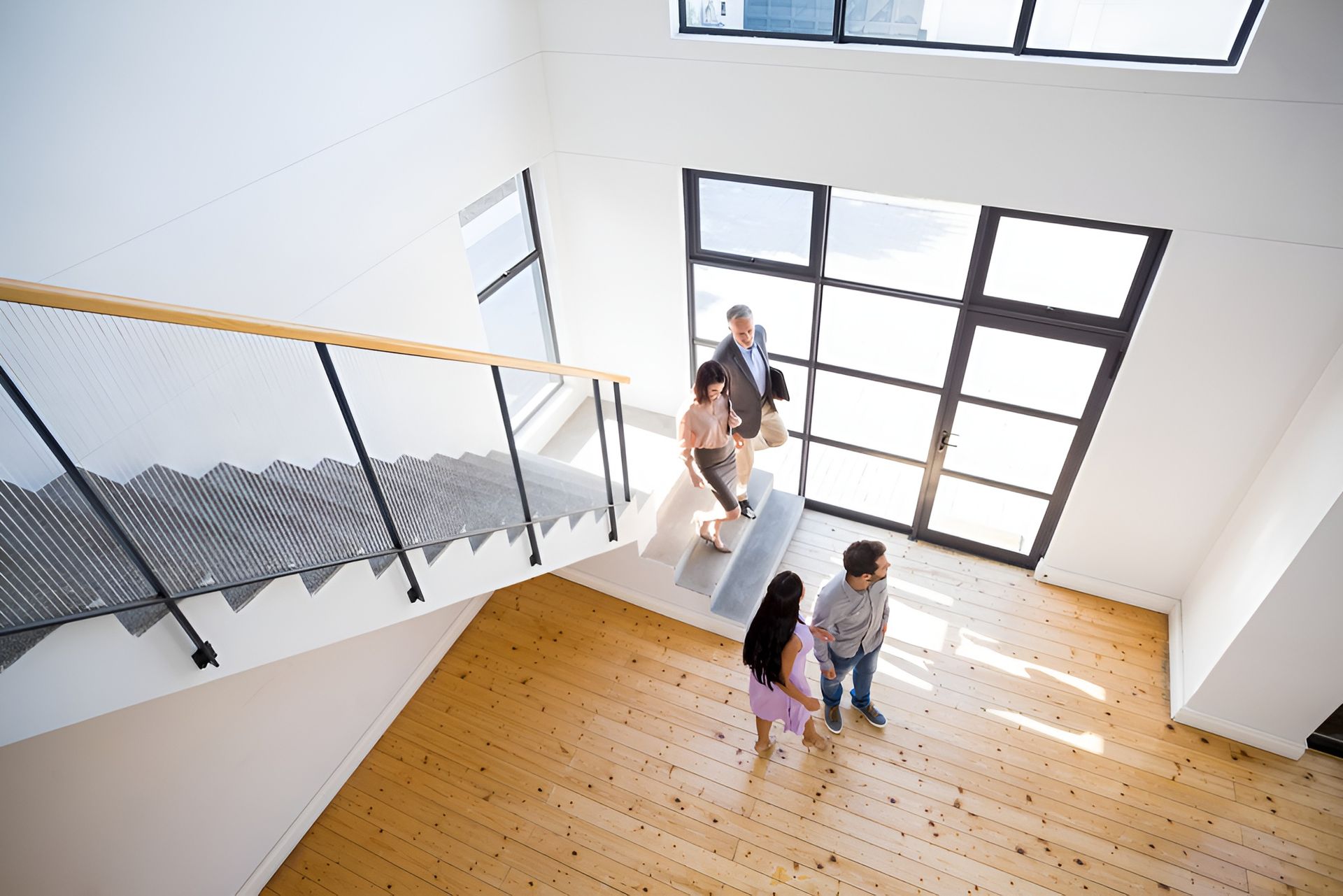 A Picture of a man carrying a woman — Hyde Burchell Buyers Agents In Canberra, ACT