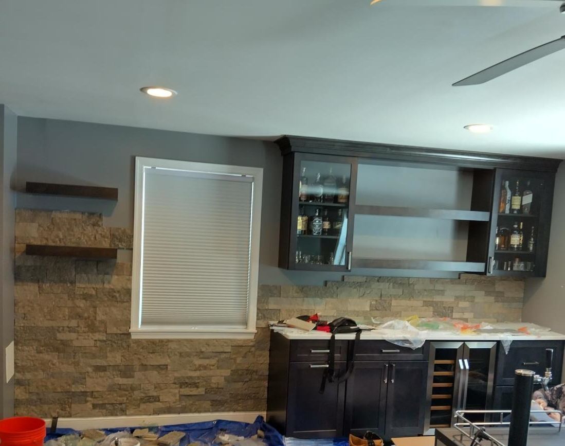 Newly installed white kitchen cabinets in a newly constructed house.