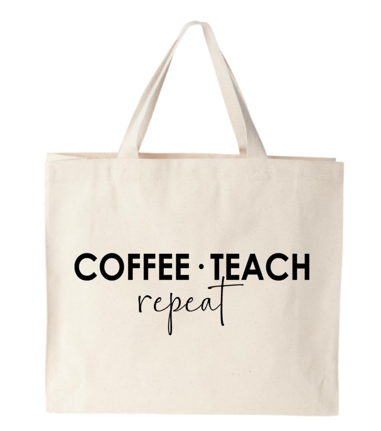 A white tote bag that says coffee teach repeat