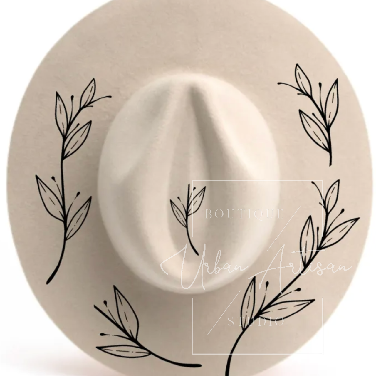 A white hat with black leaves on it