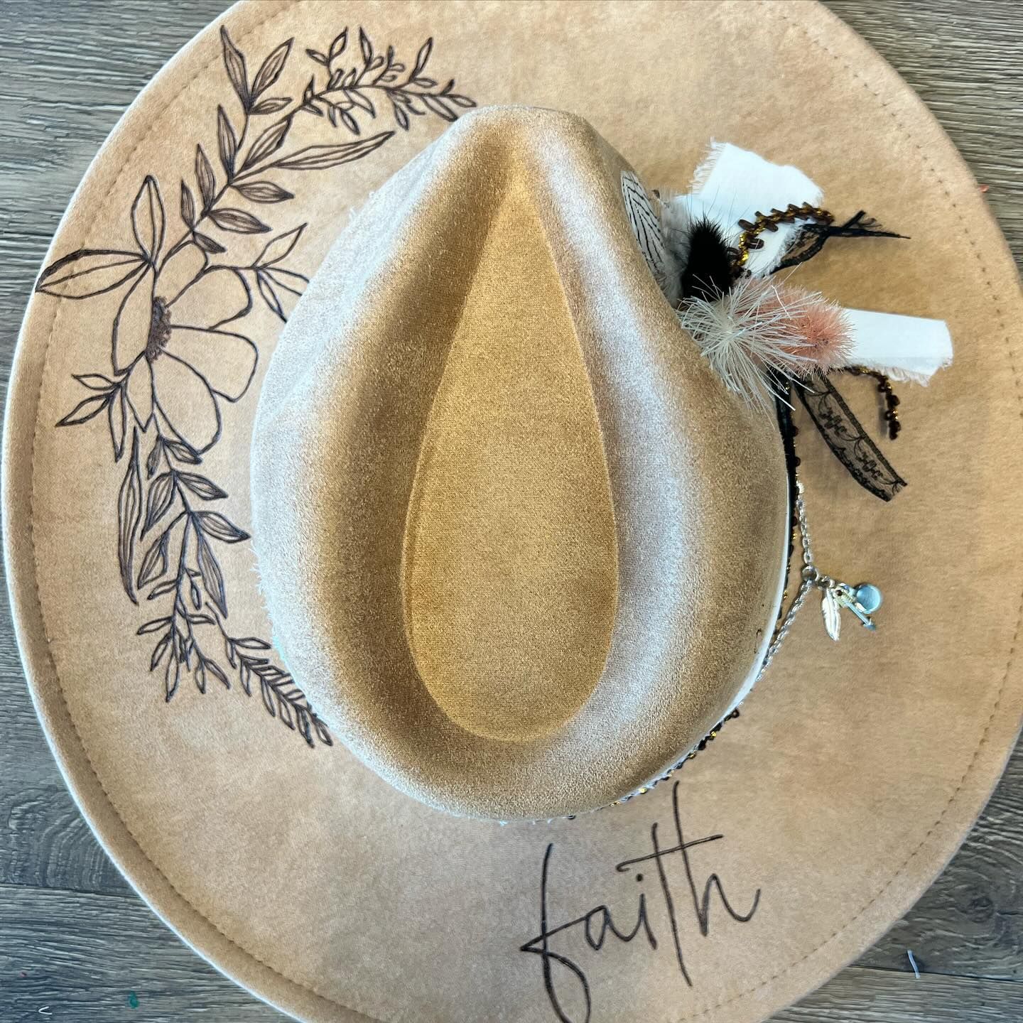 A hat with the word faith written on it