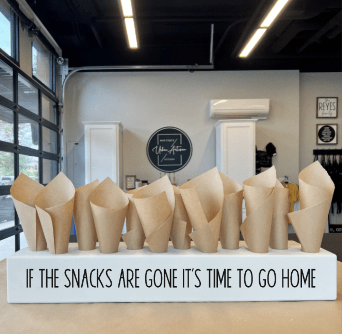 A sign that says if the snacks are gone it 's time to go home