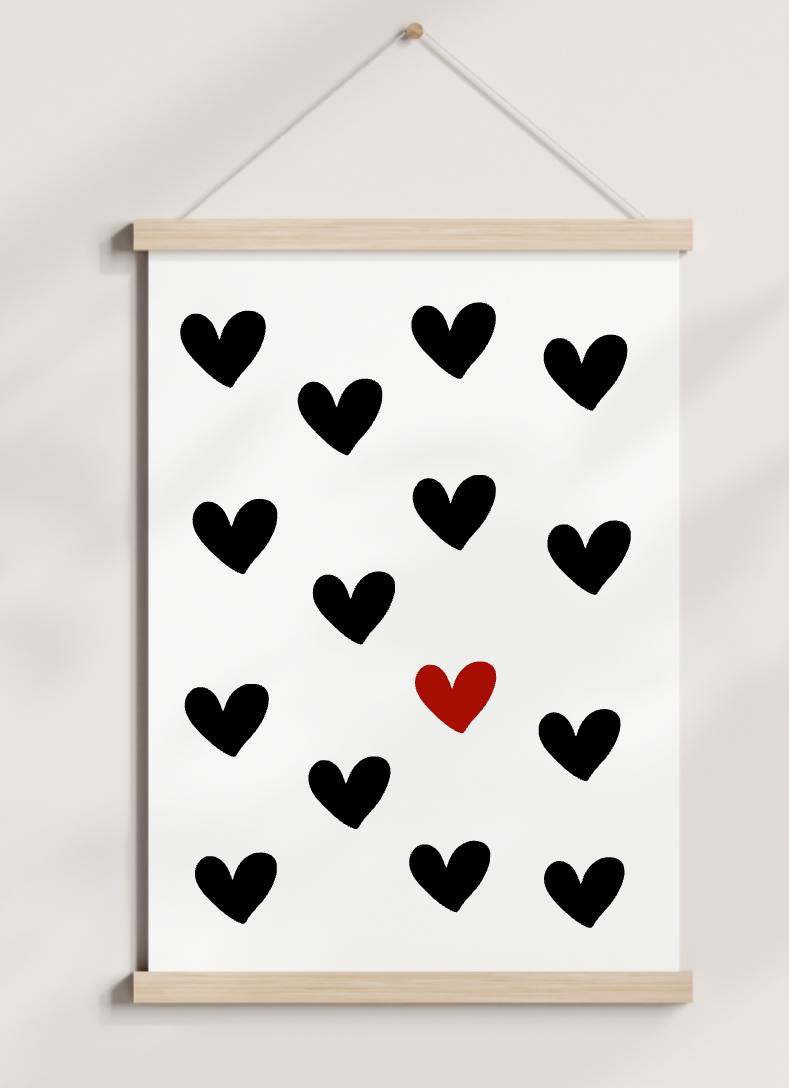 A poster of black and white hearts with a red heart in the middle