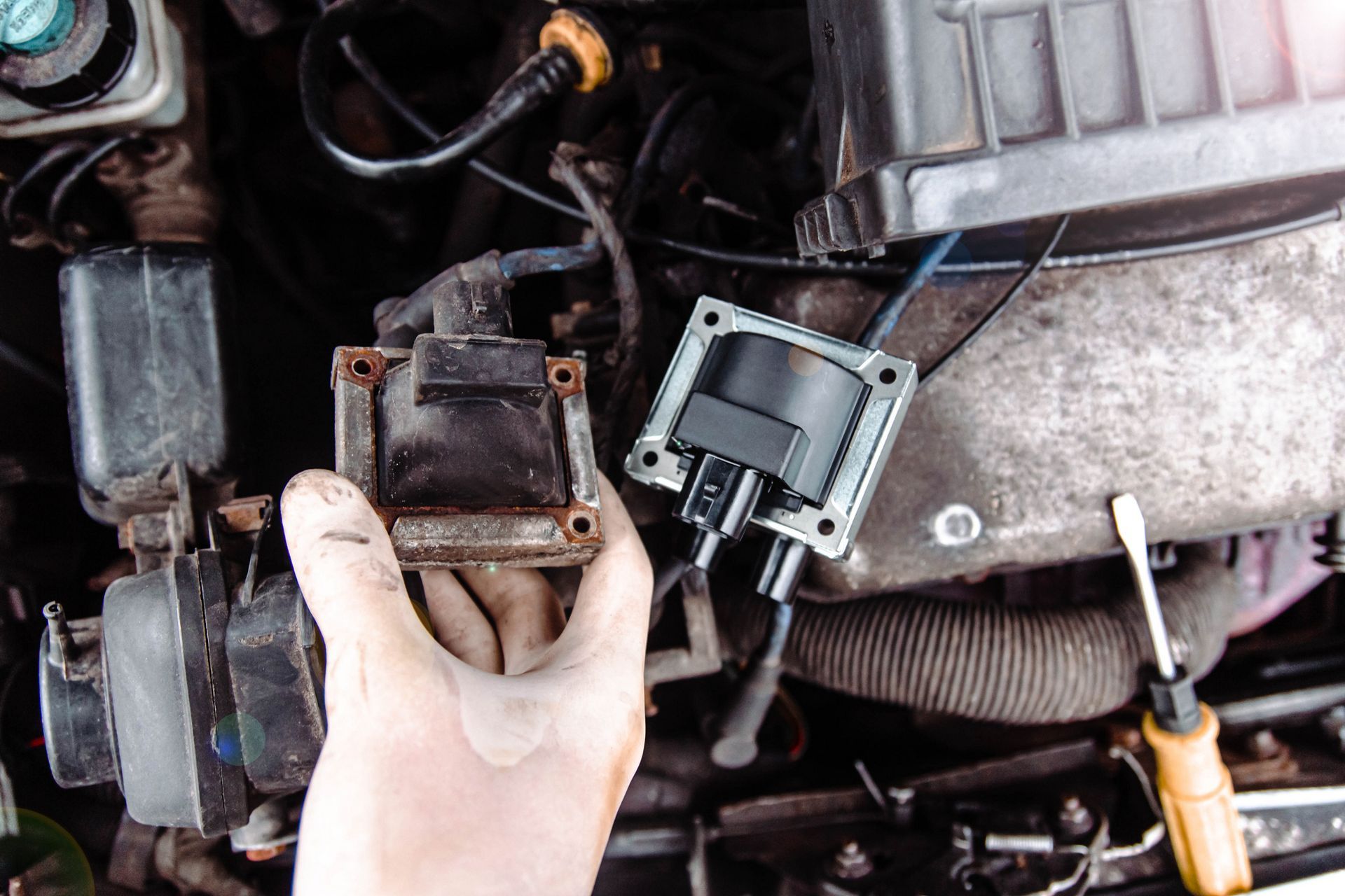 Replacing The Ignition Coil Of A Car — Liberal, KS — Myriad Machine Company Replacing The Ignition Coil Of A Car — Liberal, KS — Myriad Machine Company