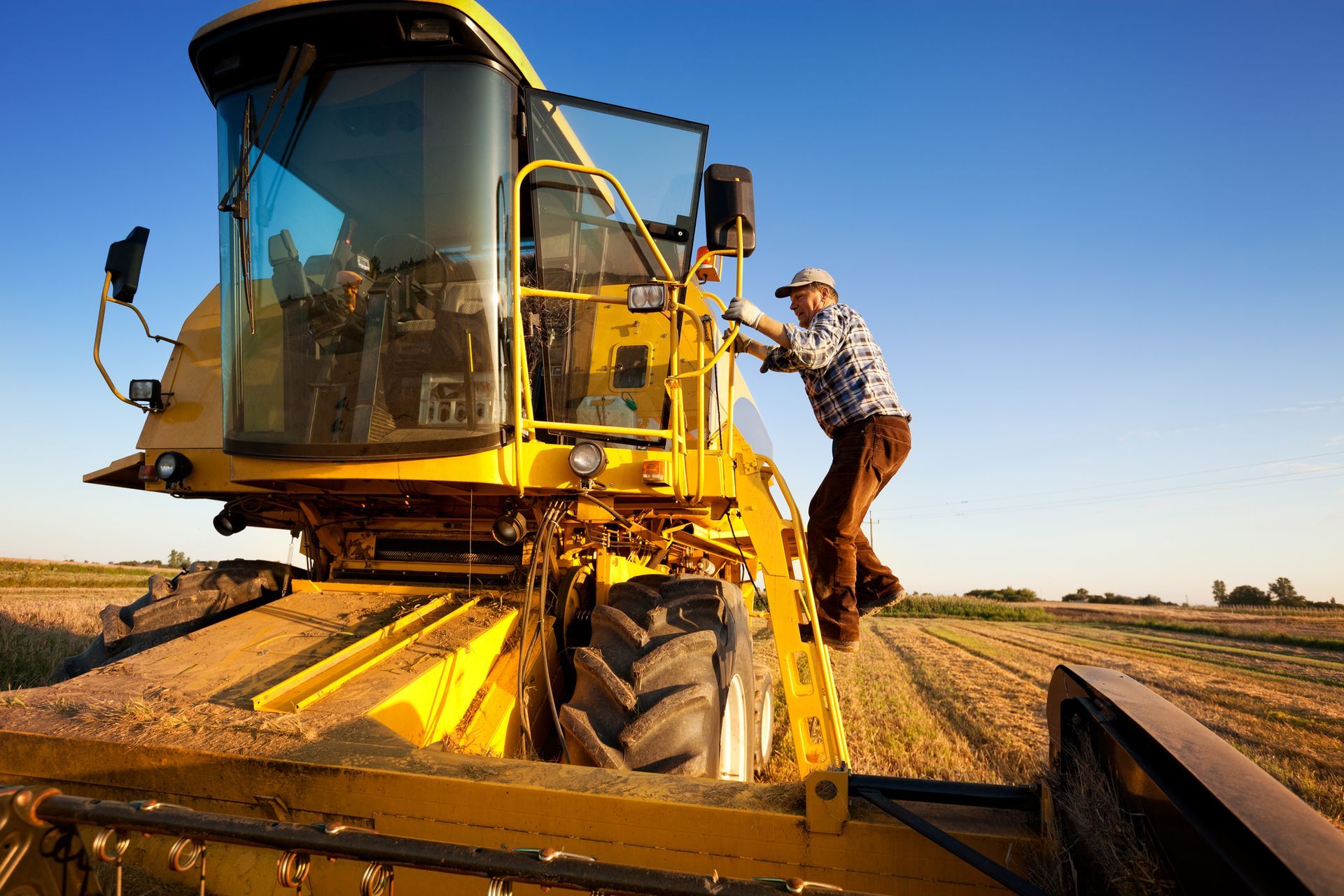 Farmer Enters The Combine Harvester — Liberal, KS — Myriad Machine Company Farmer Enters The Combine Harvester — Liberal, KS — Myriad Machine Company