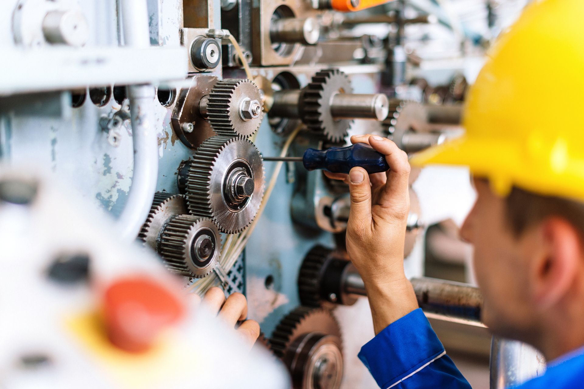 Machinist Precisely Setting Up Cog Wheels — Liberal, KS — Myriad Machine Company
