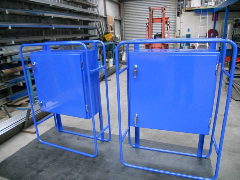 Two Blue Metal Boxes With Doors, Inside Blue Frames — SPW Engineering & Powdercoating In Ballarat, VIC