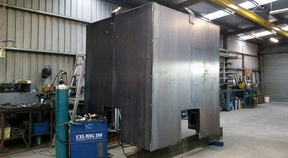 Large Metal Enclosure in a Workshop, Blue Welding Equipment, and Tools — SPW Engineering & Powdercoating In Ballarat, VIC