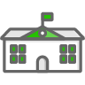 A school building with a green flag on top of it.