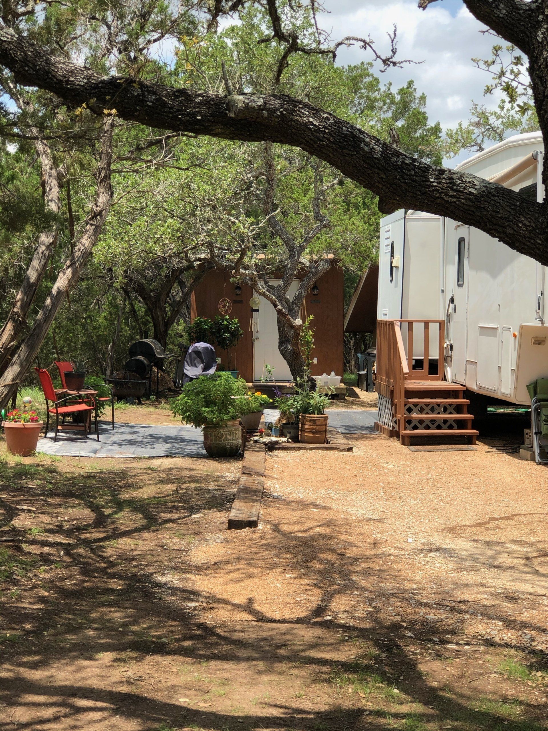 Quiet country living in Canyon Lake, Texas with mature Oak and Cedar trees throughout Oak Meadows RV Park!