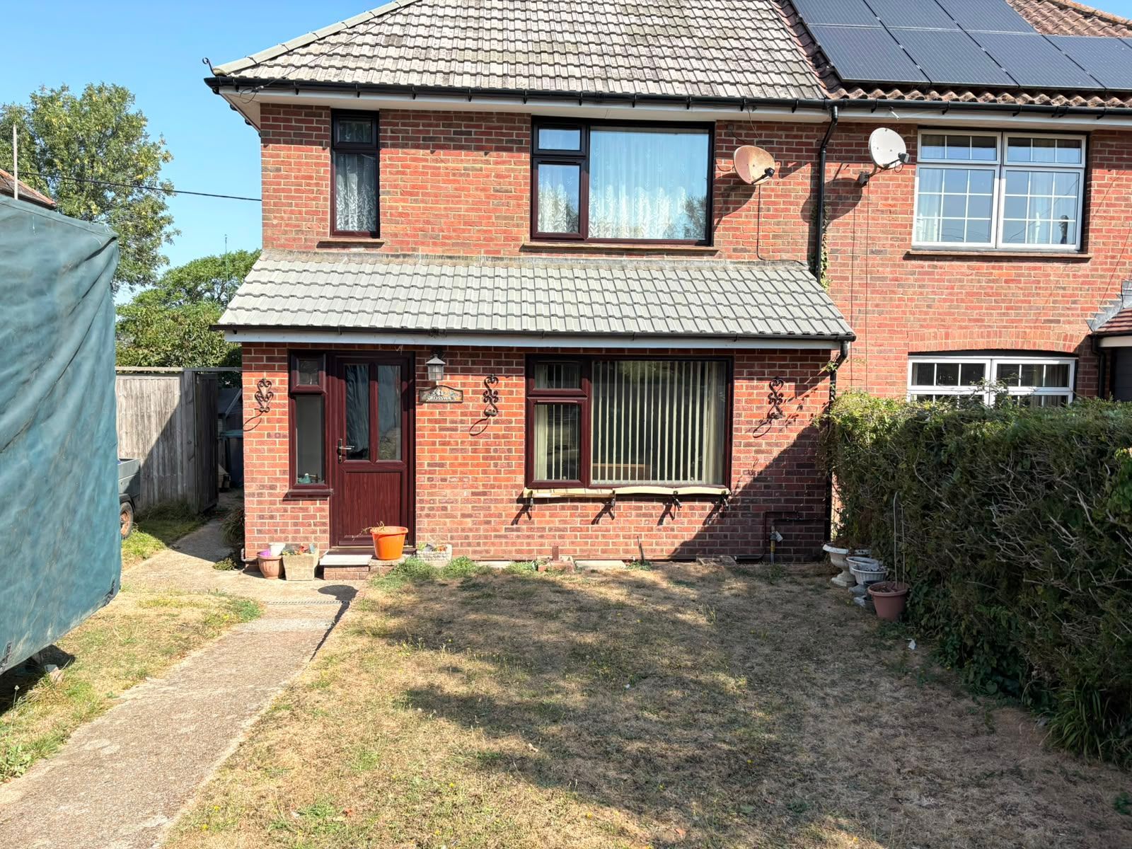 Newly tiled front bay roof matching the main house roof in Newbridge, Isle of Wight