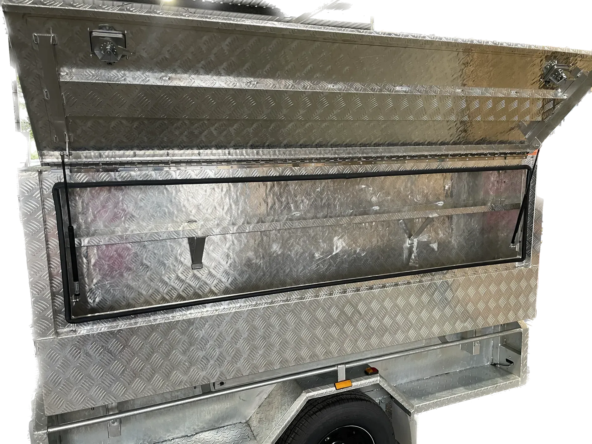 Silver Diamond-Plate Truck Tool Box with An Open Lid and Long Rectangular Compartment — SSCFW Trailers In Innisfail, QLD