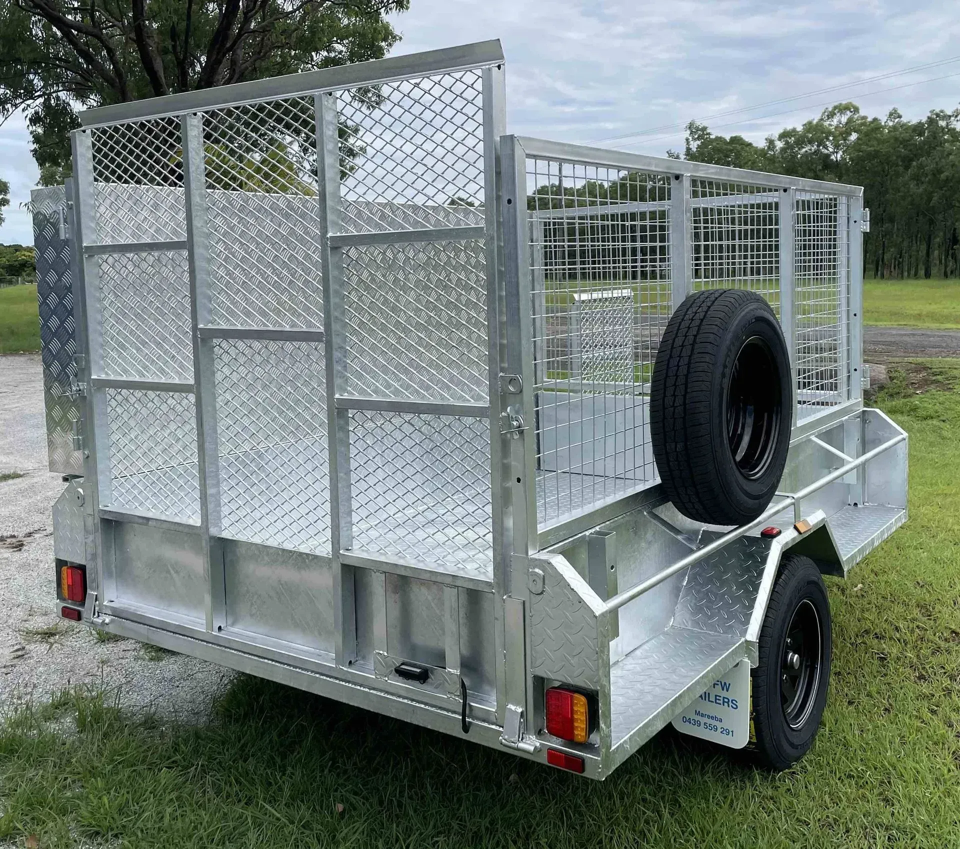 Silver Utility Trailer with Mesh Cage Sides — SSCFW Trailers In Mareeba, QLD