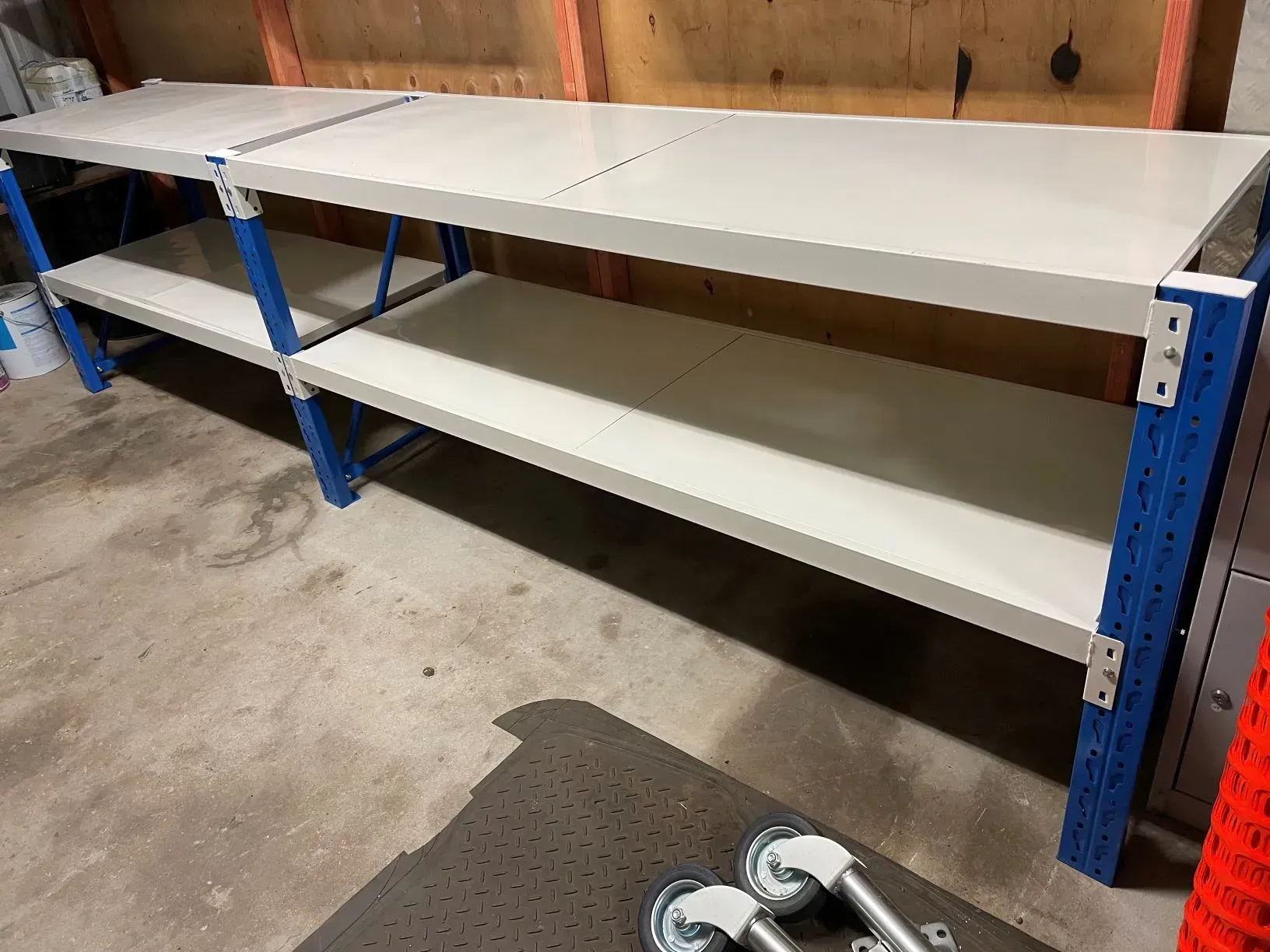 Blue Shelving Unit with White Shelves in A Garage/workshop — SSCFW Trailers In Cassowary Coast, QLD