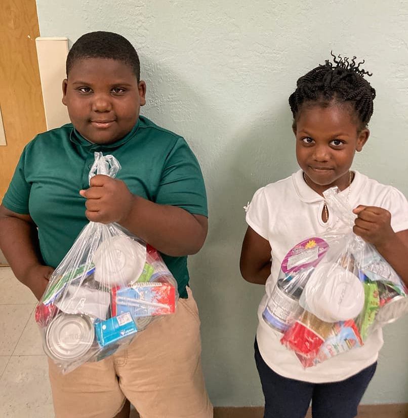 school children, childhood hunger initiatives, school backpack program, weekend meals, elementary school

