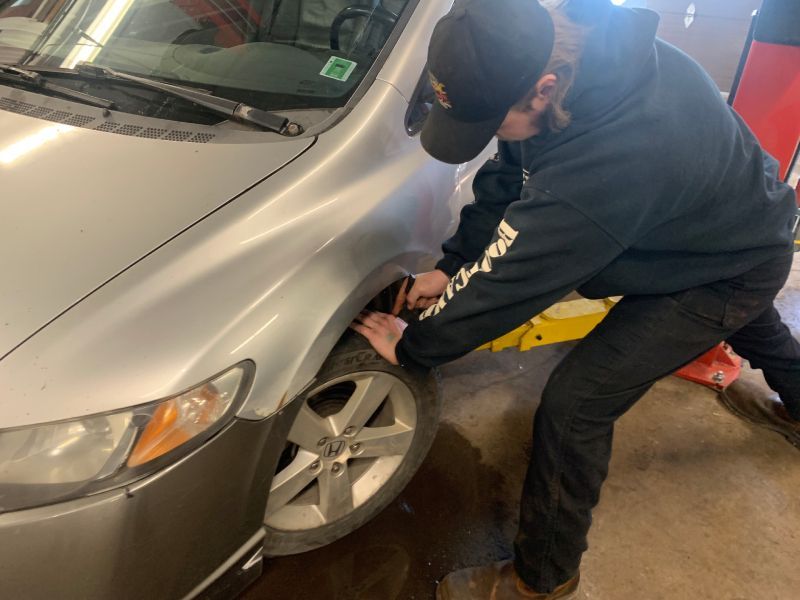 Flat Tire Repair with plug and patch | Tiny's Automotive