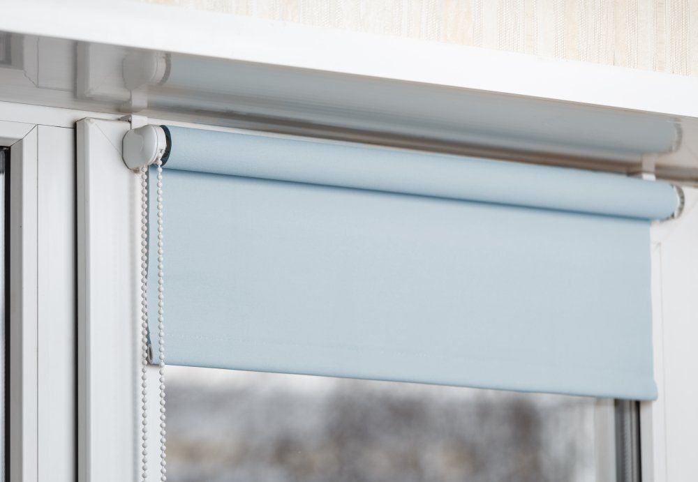 Blue Blackout Roller Blind — Custom Blinds & Flooring in Caboolture, QLD