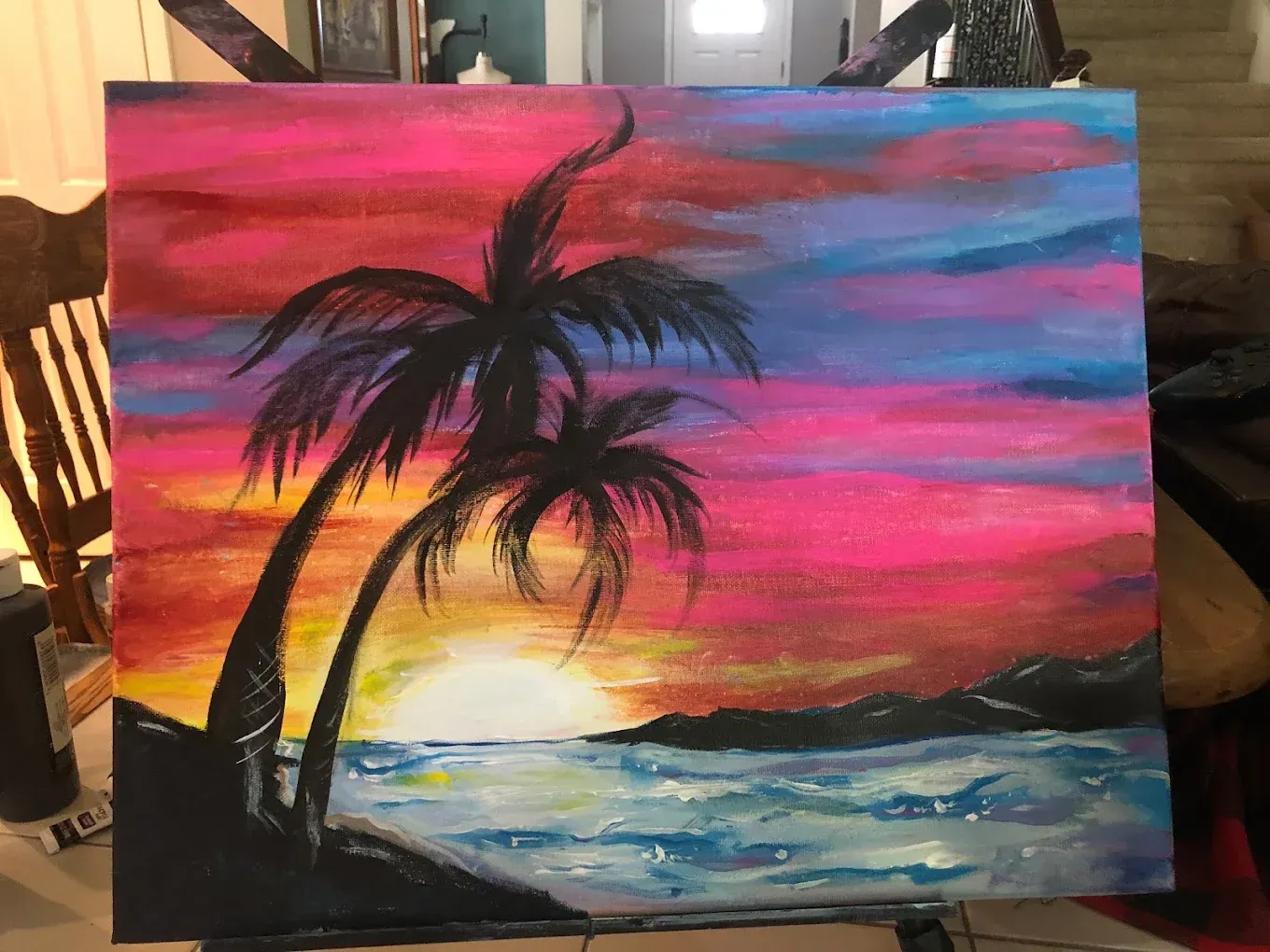 Sunset beach painting with palm trees, pink and blue sky, and ocean waves
