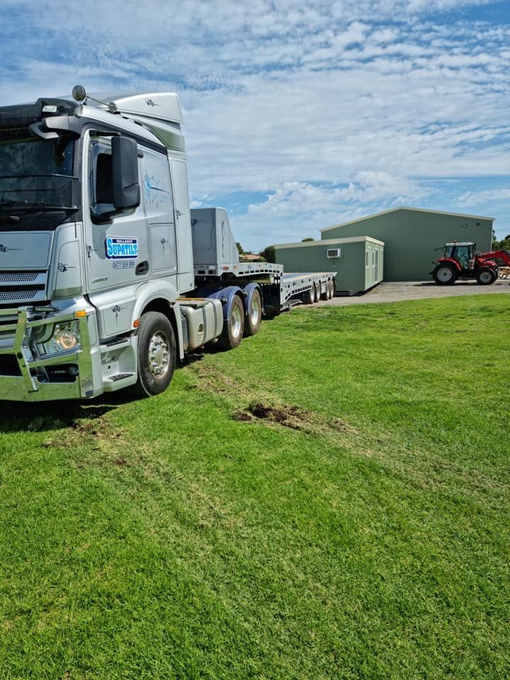 Car with a Caravan Attached to the Trailer — Ballarat Supatilt in Delacombe, VIC