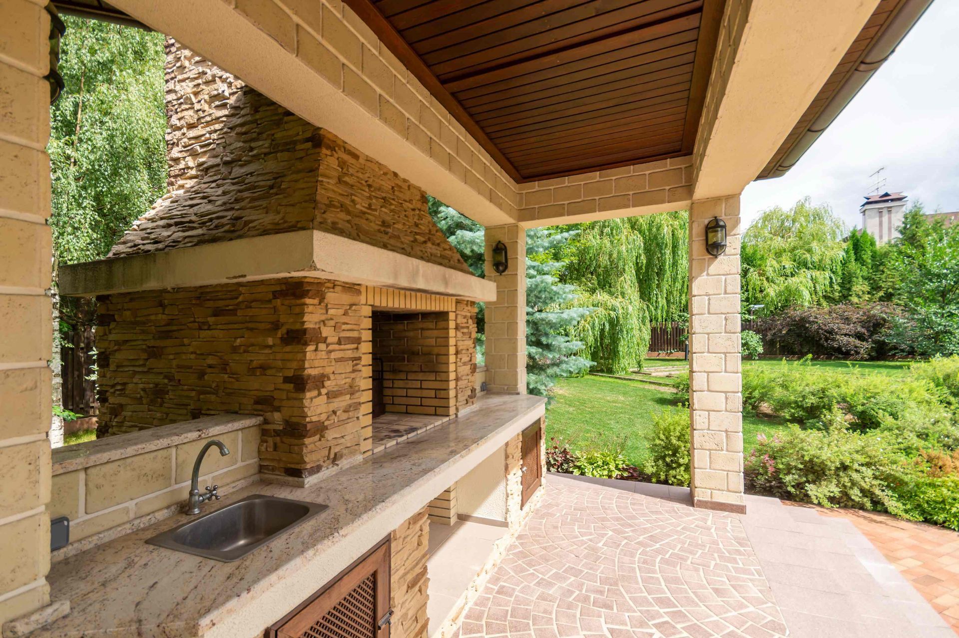 An image of a built-in kitchen in a pavilion for lounging or entertaining guests at SummerHouse Outdoor Structures near Central Pennsylvania