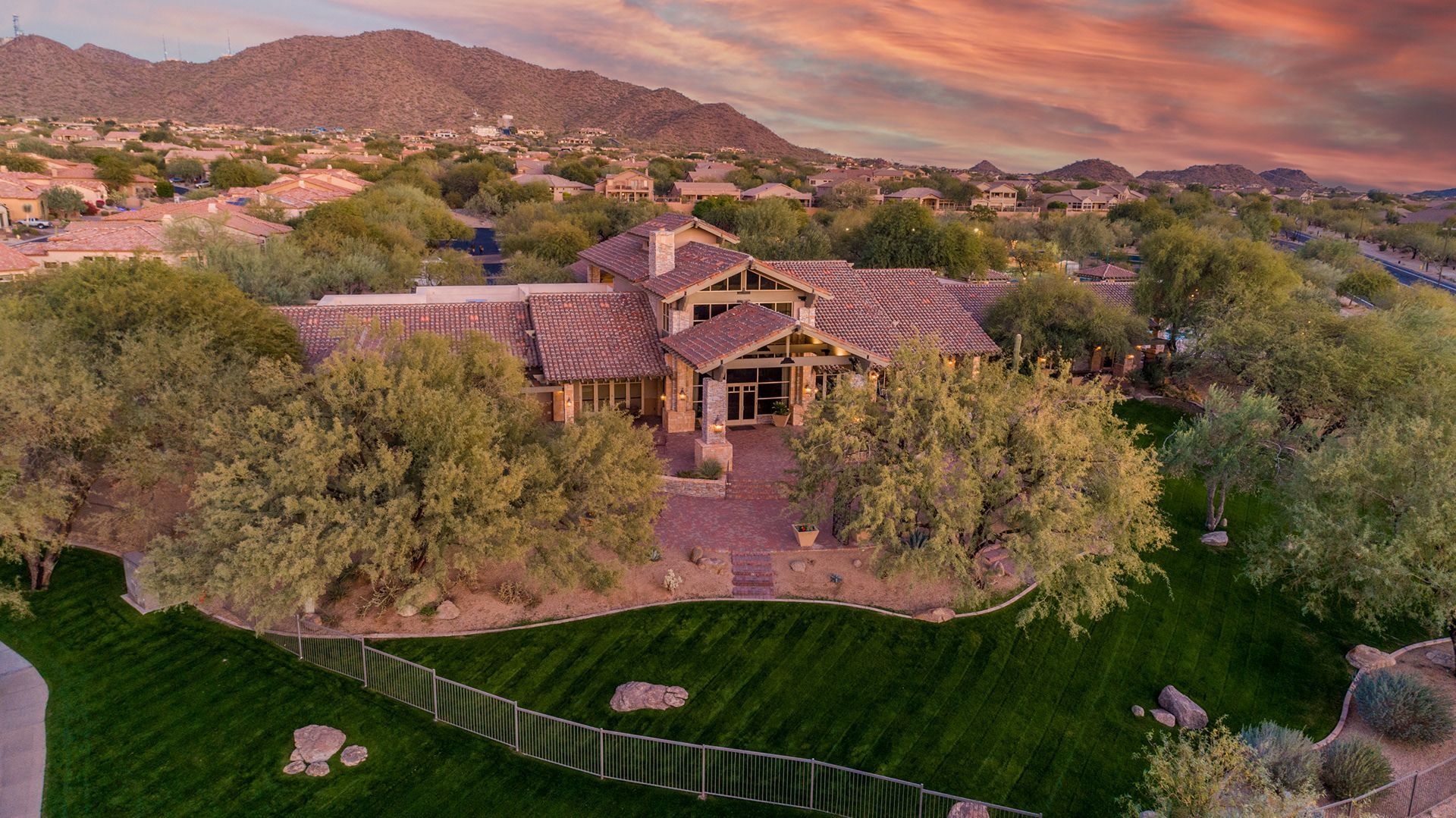 Happy homeowners closing on a Mesa AZ property with a 14-day mortgage loan